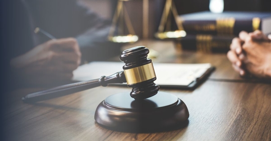 person consulting with attorney